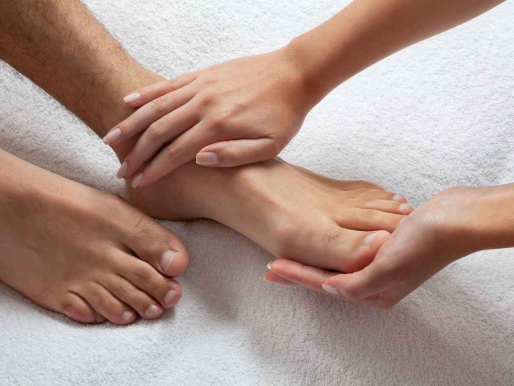 Give an exfoliating massage to hands and feet
